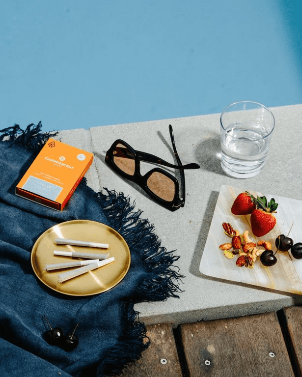 Relaxing in a back garden with Canndescent effects-based pre-rolls